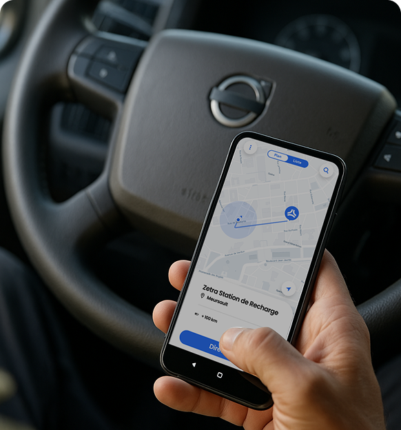 Chauffeur en cabine utilisant l'application mobile E-XOS